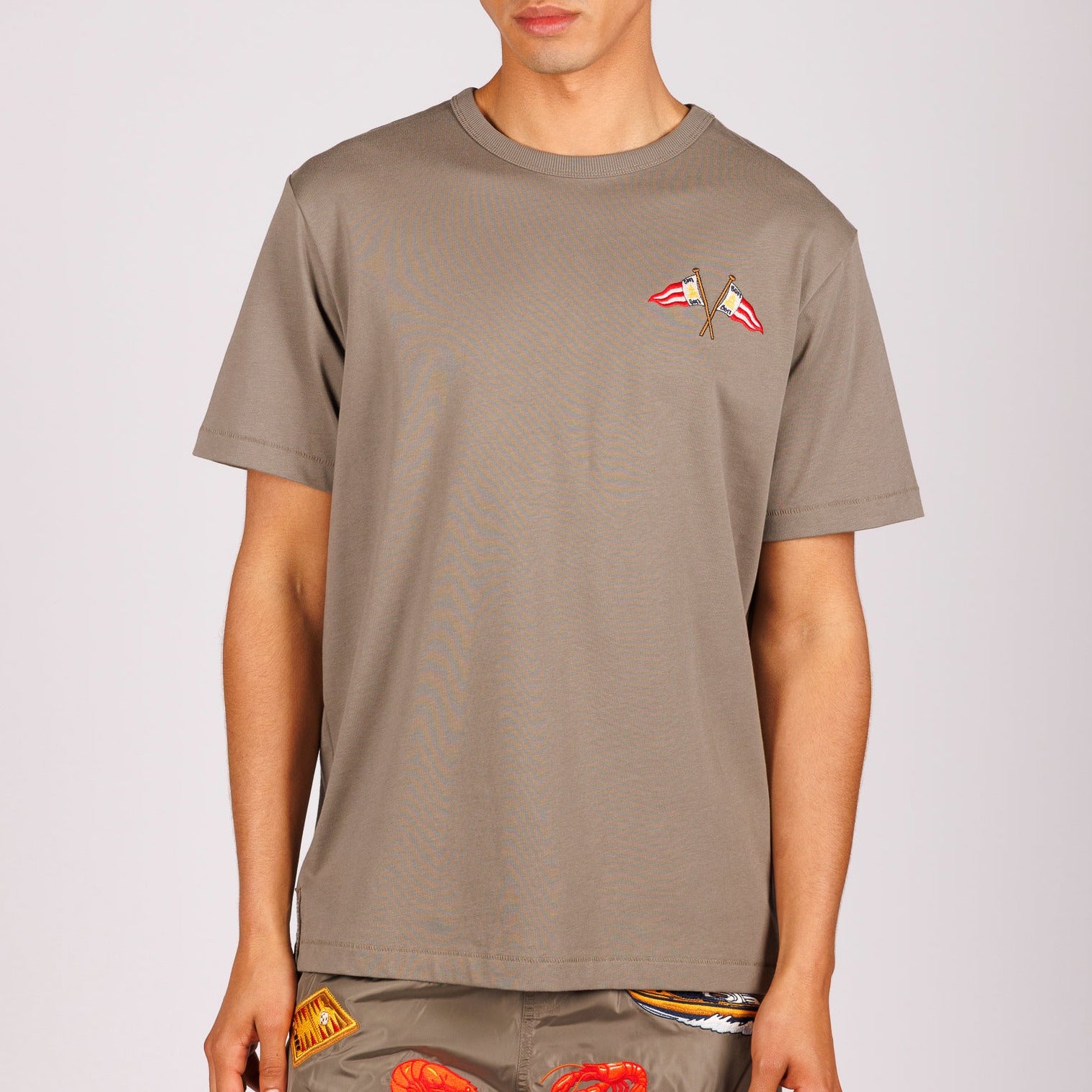 Khaki T-shirt front view with illustrated graphic