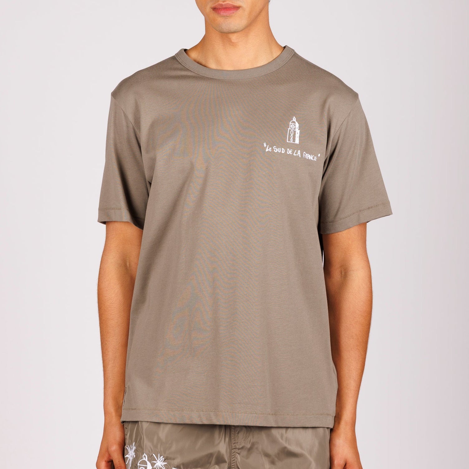 Khaki T-shirt front view with illustrated graphic and text
