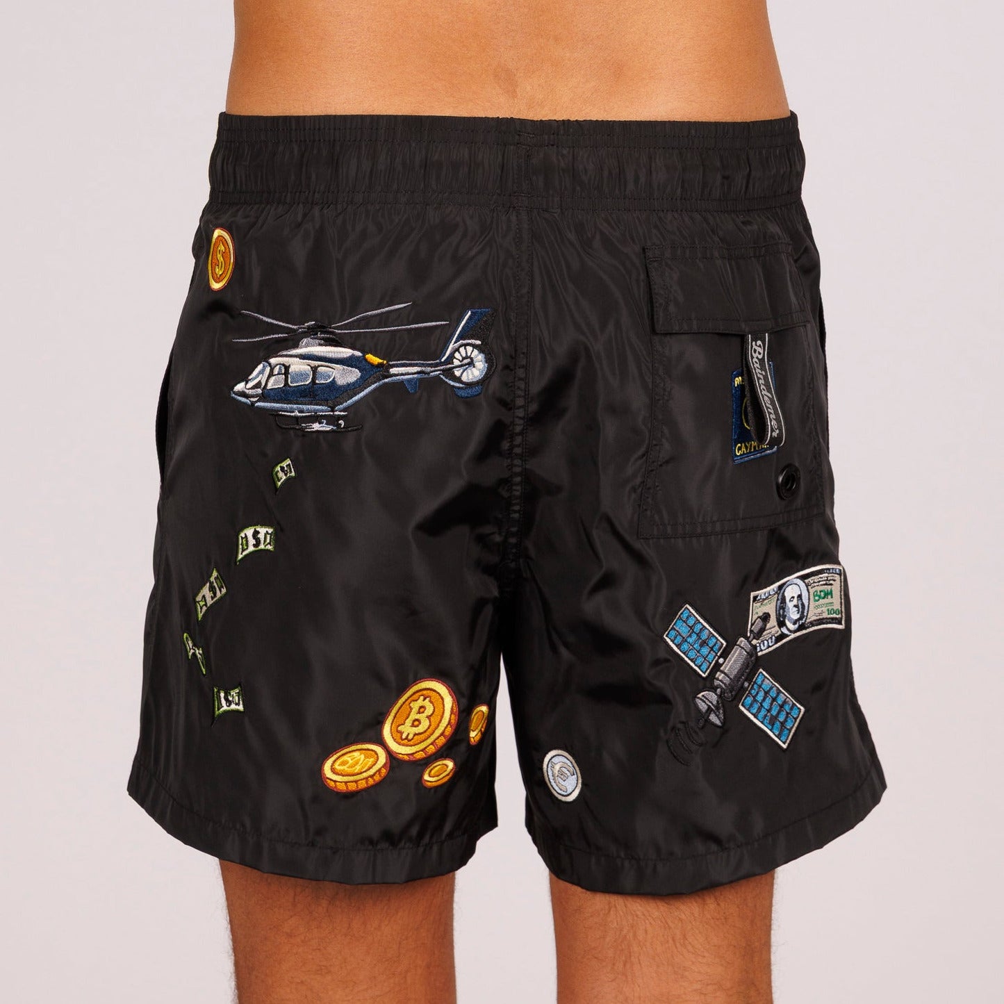Black swim shorts back view with illustrated graphic
