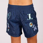 Navy blue swim shorts back view with illustrated graphic