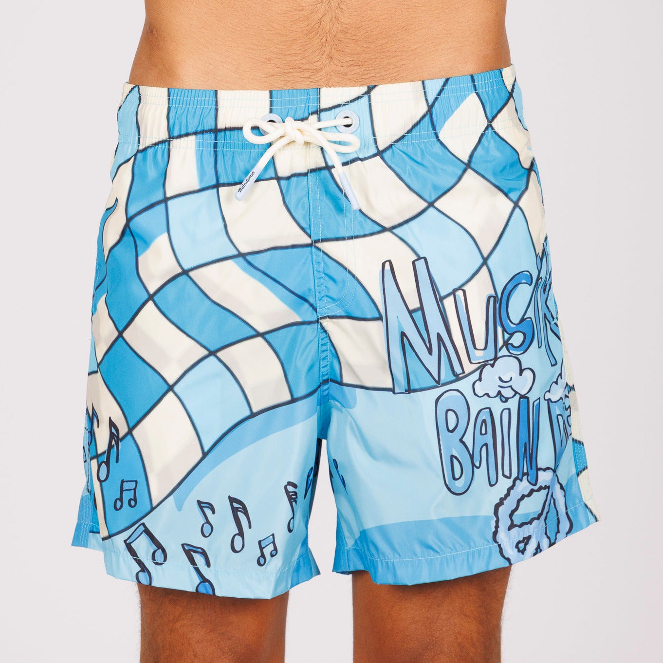 Blue swim shorts front view with all-over illustrated graphic and text