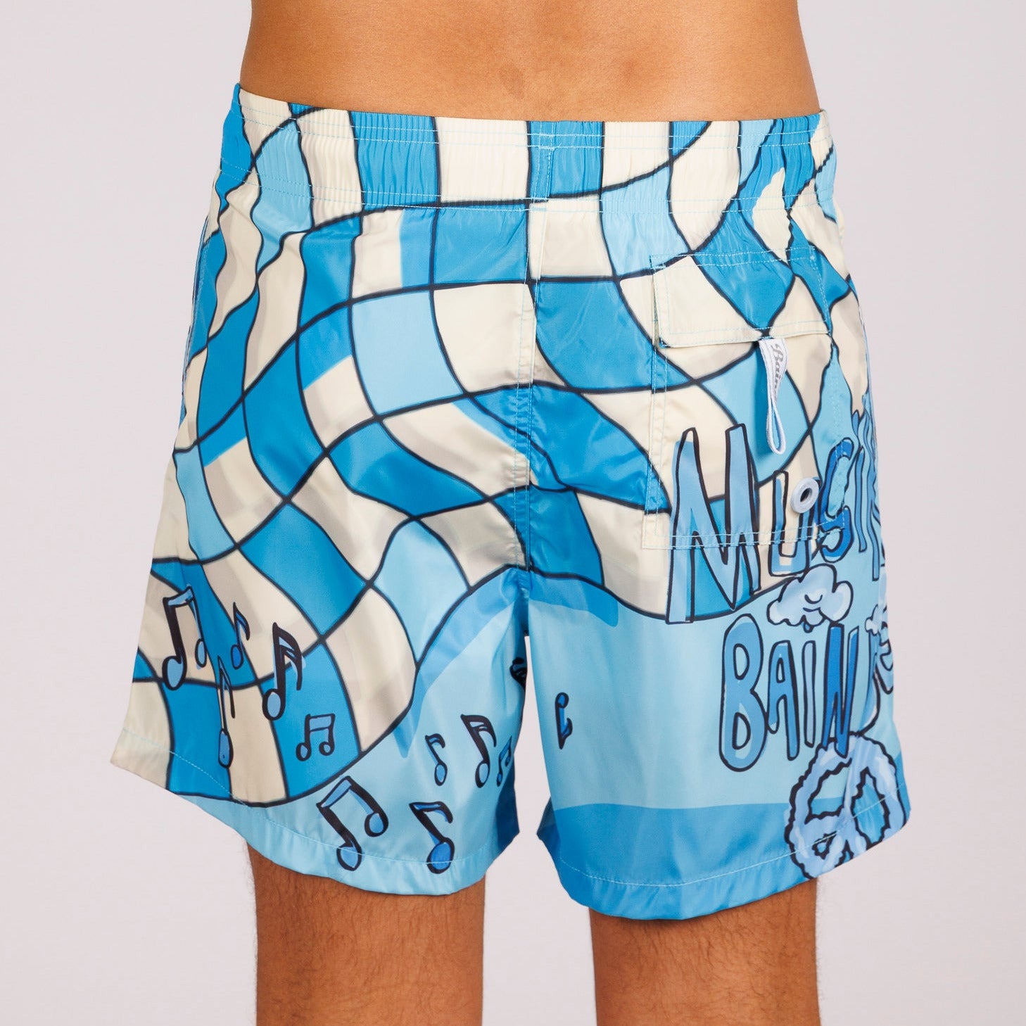 Blue swim shorts back view with all-over illustrated graphic and text