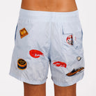 Light blue swim shorts back view with illustrated graphic