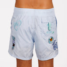 Light blue swim shorts back view with illustrated graphic