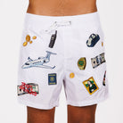 White swim shorts front view with illustrated graphic and “Taxes optimized” text