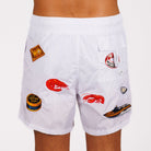 White swim shorts back view with illustrated graphic