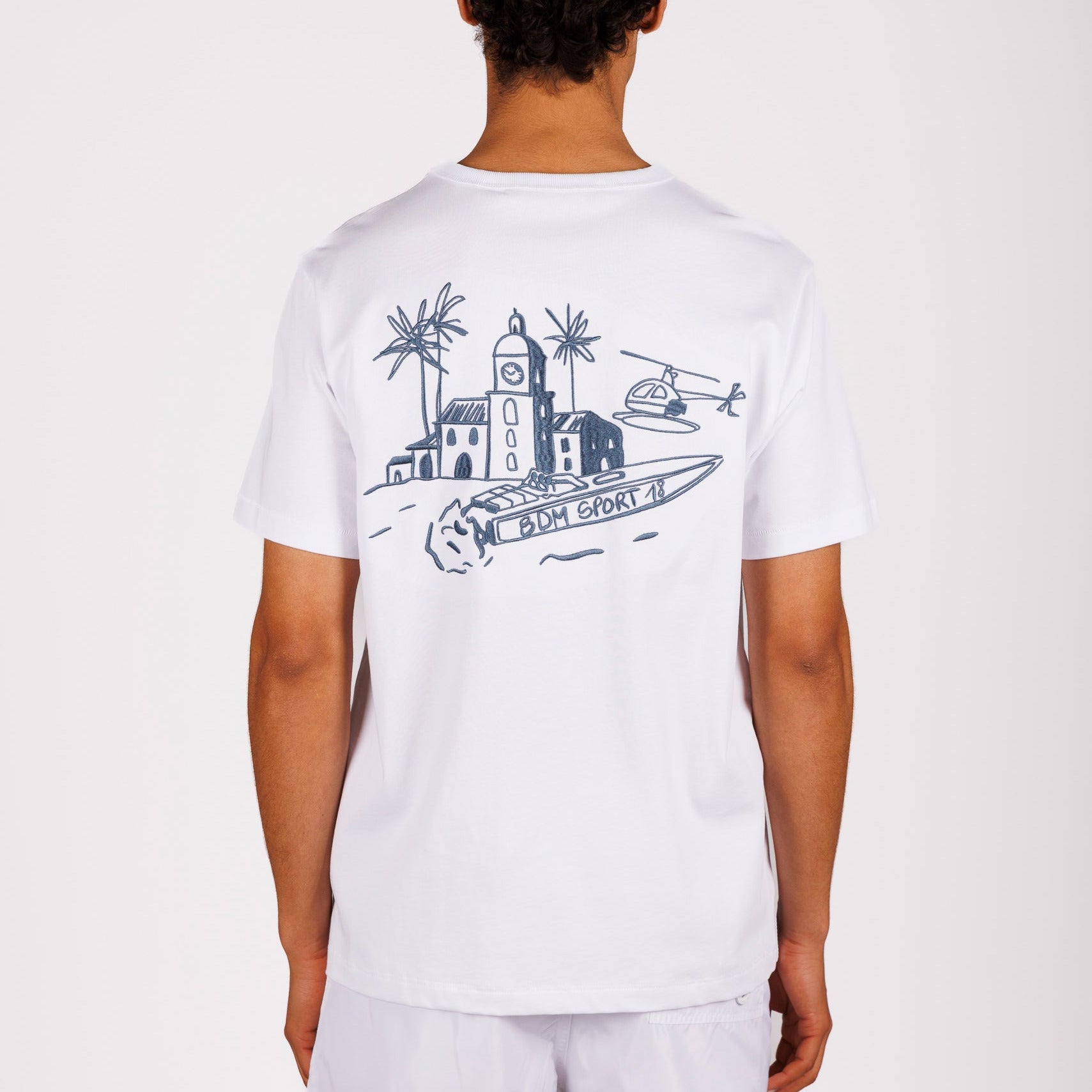 White T-shirt back view with illustrated graphic and “BDM sport 18” text