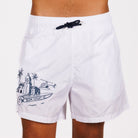 White swim shorts front view with illustrated graphic and “BDM Sport 18” text