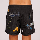 Black swim shorts back view with illustrated graphic